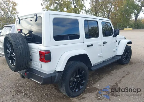 2021 Jeep Wrangler 4Xe Unlimited Sahara 4X4 z USA, uszkodzony, nr VIN 1C4JJXP61MW804833